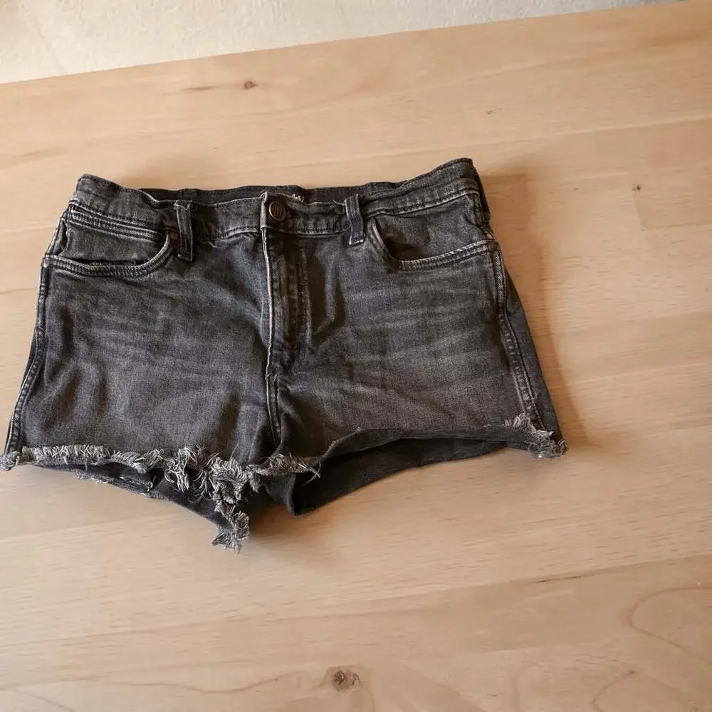 Wrangler High-Rise Raw Hem Black Denim Cutoff Shorts